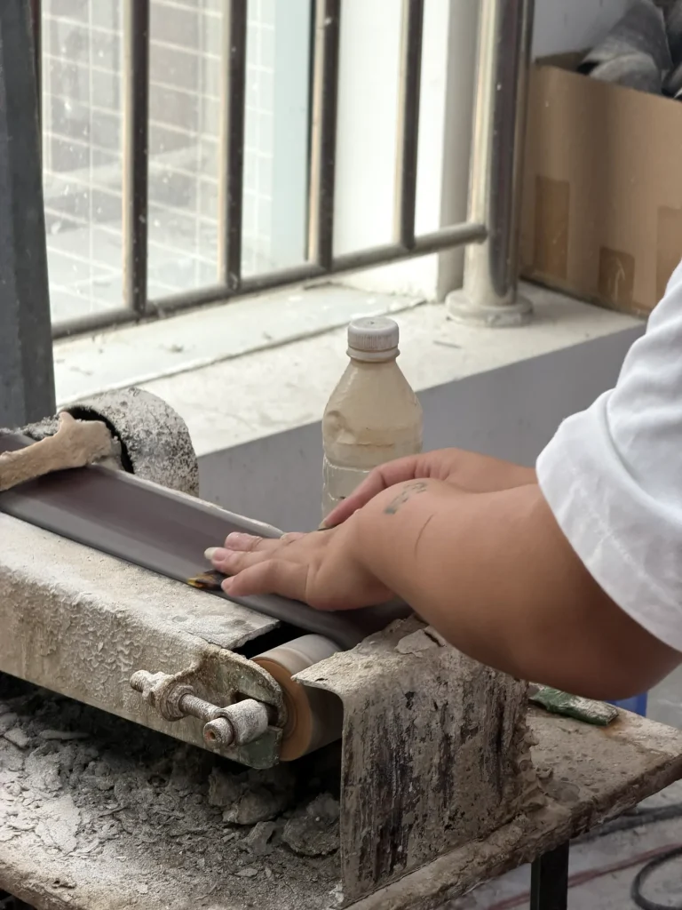Acetate component edge sanding