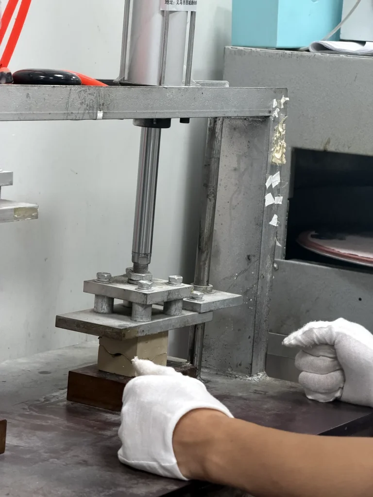 Acetate component forming press