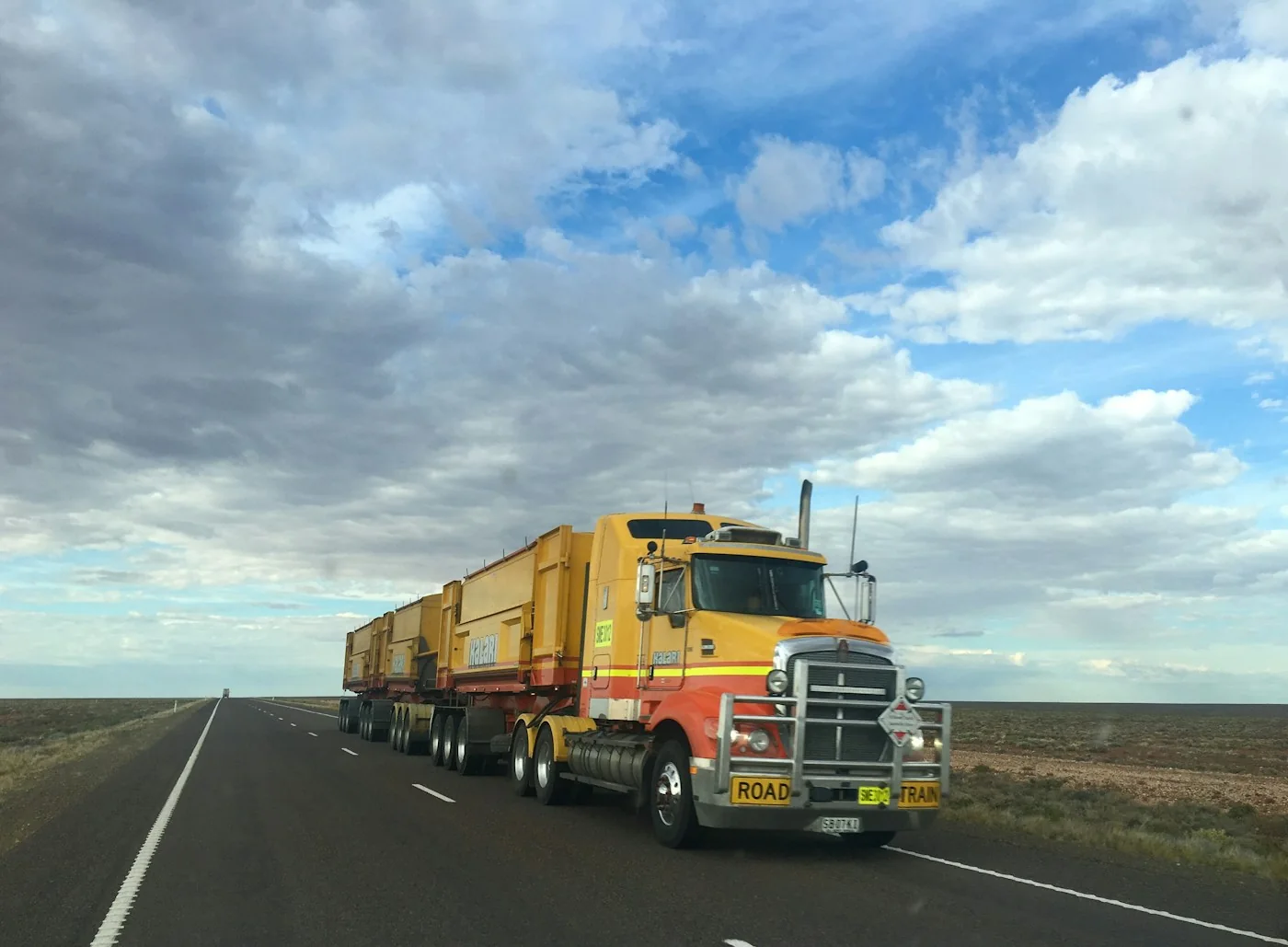 Freight truck carrying cargo along a highway