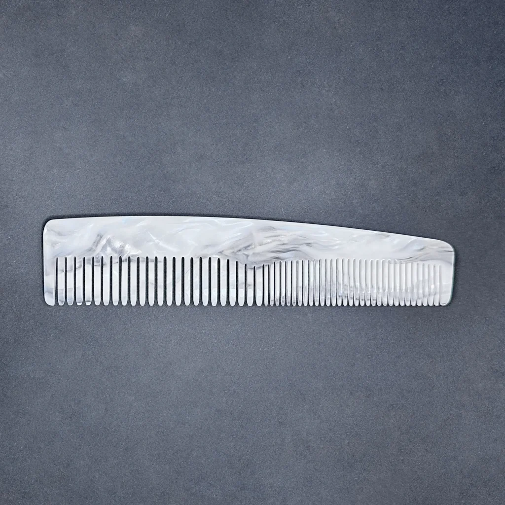 Transparent cellulose acetate comb on display