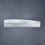 Transparent cellulose acetate comb on display